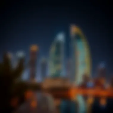 Night view of the Al Hudaiba Awards Building illuminated against the Dubai skyline