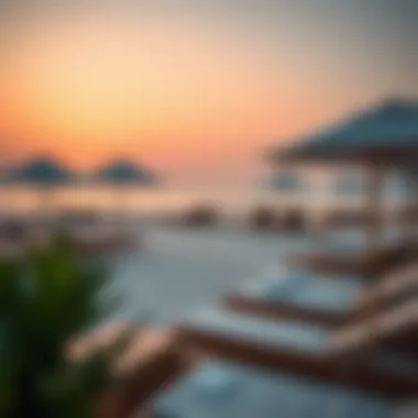 Luxurious Amenities at Al Bateen Beach Luxurious beach amenities including sun loungers and umbrellas, providing comfort for visitors