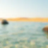 A tranquil beach scene in Dubai with golden sands and crystal-clear waters