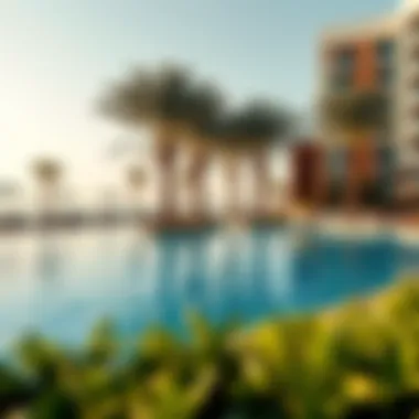 Outdoor pool with sun loungers and palm trees