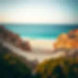 Serene view of a secluded beach with golden sands and turquoise waters